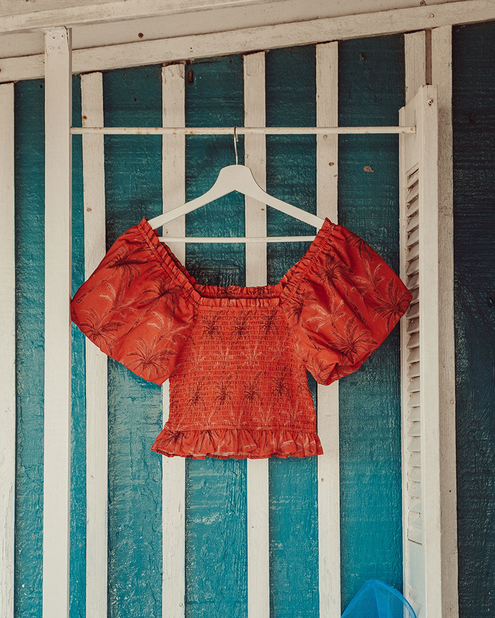 BLUSA PUMBA ORANGE PALMS