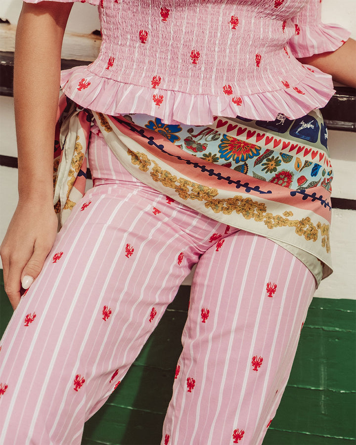 Pantalón Mare suelto de cotton lino rosa con líneas blancas, bordado de langosta, prenda sostenible para mujer Chile.