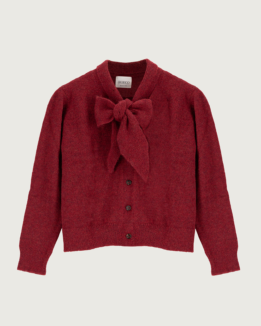 Chaleco de lana de alpaca premium Melyon color rojo de la colección Her Story, de silueta fluida con lazo de cinta en el cuello y cierre de botones de moda ética urco.