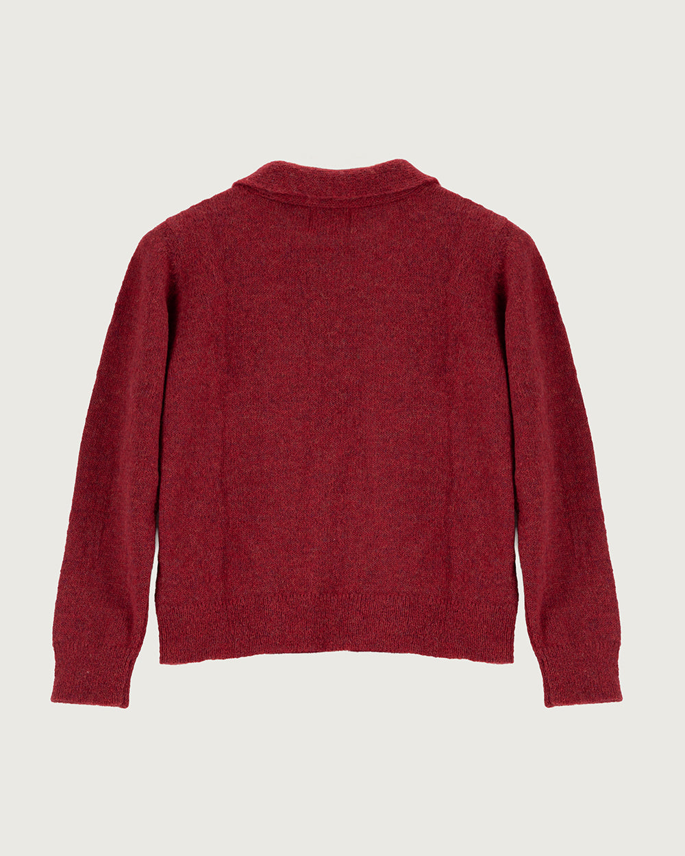 Chaleco de lana de alpaca premium Melyon color rojo de la colección Her Story, de silueta fluida con lazo de cinta en el cuello y cierre de botones de moda ética urco.