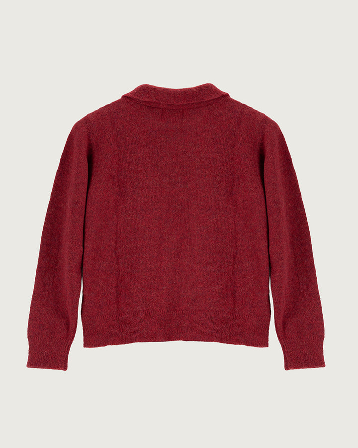 Chaleco de lana de alpaca premium Melyon color rojo de la colección Her Story, de silueta fluida con lazo de cinta en el cuello y cierre de botones de moda ética urco.